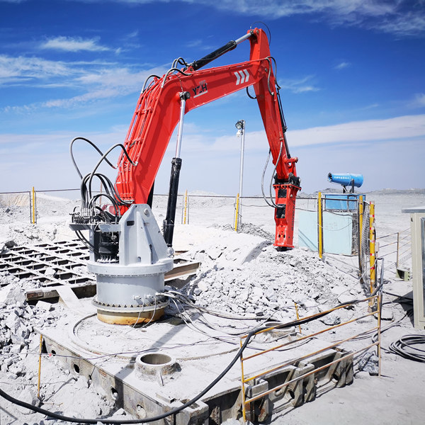 What are the main components of a pedestal boom rockbreaker? З яких основних компонентів складається камедоломна стріла на підставці?