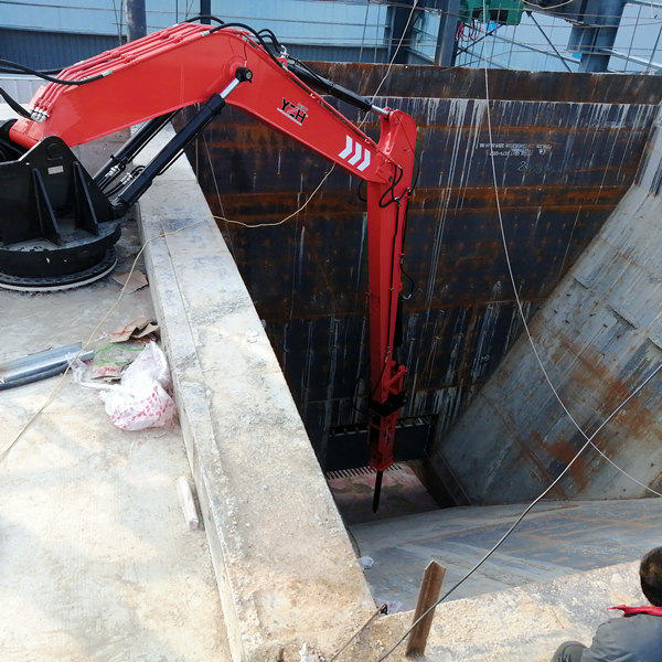 What are the main components of a pedestal boom rockbreaker? З яких основних компонентів складається камедоломна стріла на підставці?