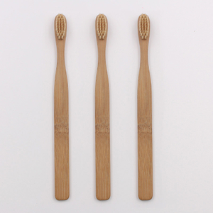 Cepillo de dientes de bambú con mango plano y forma recta
