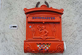 What Are the Unique Design Features of the House Mailbox?