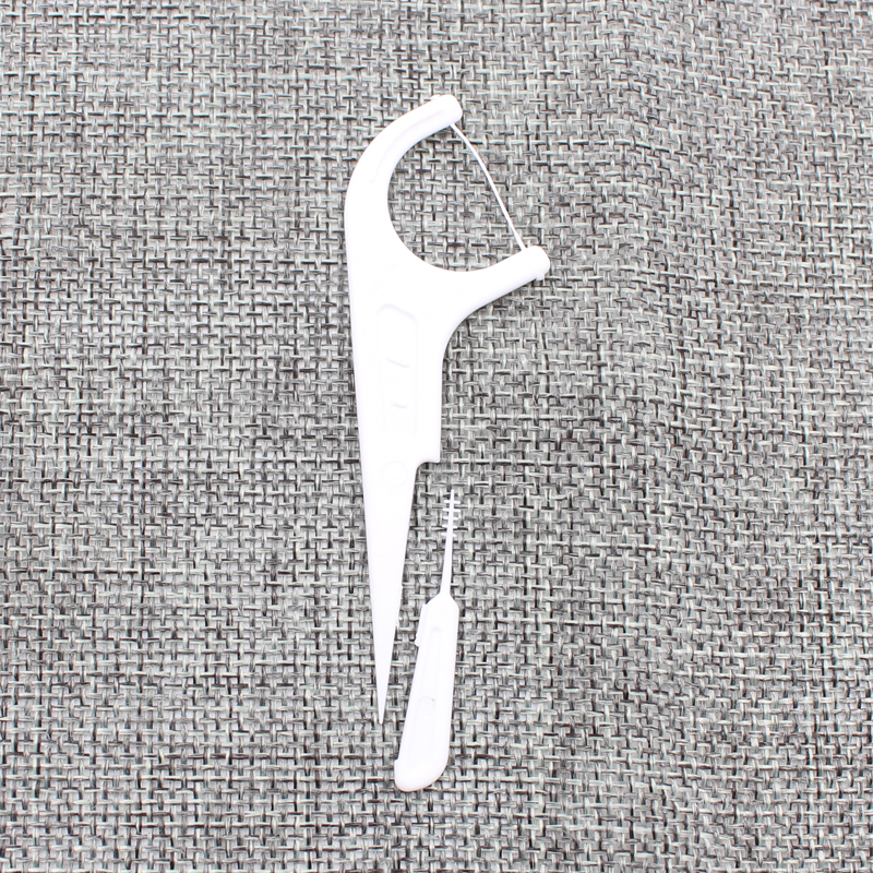 2 in 1 Flosser with tiny brush on tear