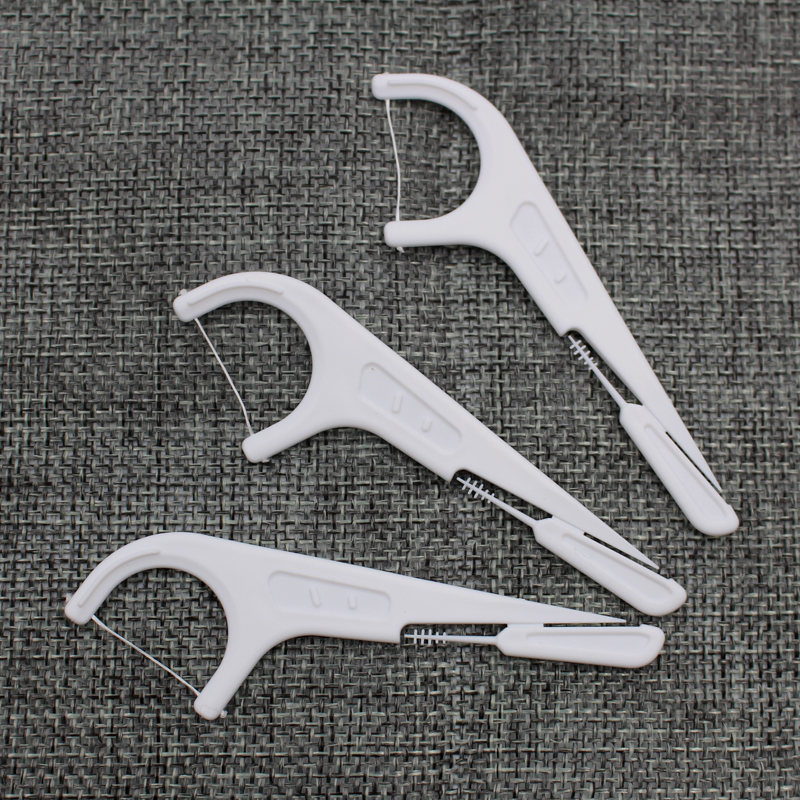 One flosser with 3 functions - floss, Pick & brush