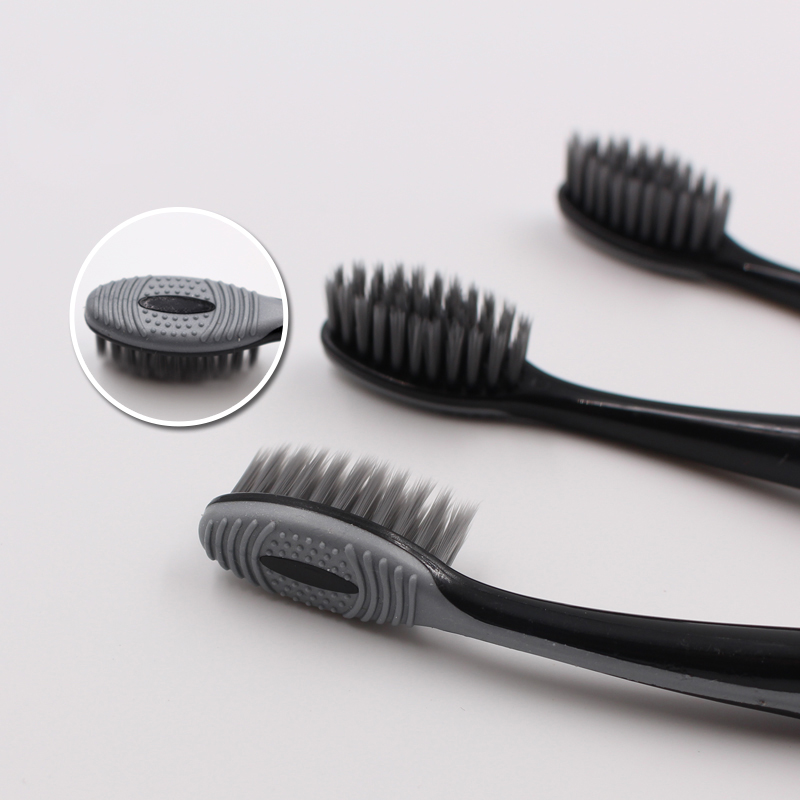 With tongue scrapper on head