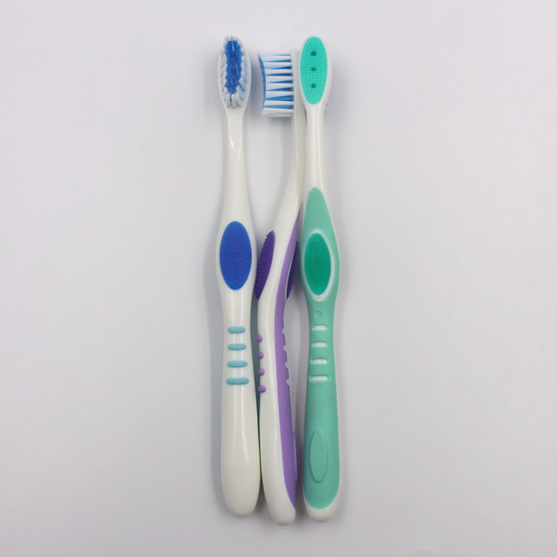 With tongue scrapper on head