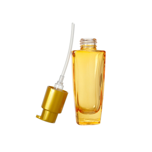 Emballage de bouteille de pompe d'émulsion de Lotion cosmétique en verre d'huile essentielle jaune clair de soin de la peau, bouteille liquide d'essence faciale en verre