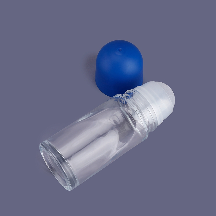 Il nuovo logo personalizzato di lusso squisito e colore 50 ml Diametro sfera 28,6 mm Altezza 110 mm Olio essenziale trasparente vuoto Antitraspirante Rotolo ricaricabile su bottiglia di vetro per profumo