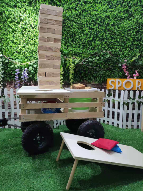 All-terrain Wagon That Transforms into Backyard Games Like Cornhole, Washers,Jenga Yard Dice And Pong! Yard Games On-The-Go Yard Game Center