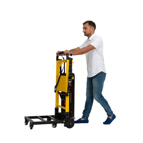 A person pushing an Electric Stair Climbing Dolly