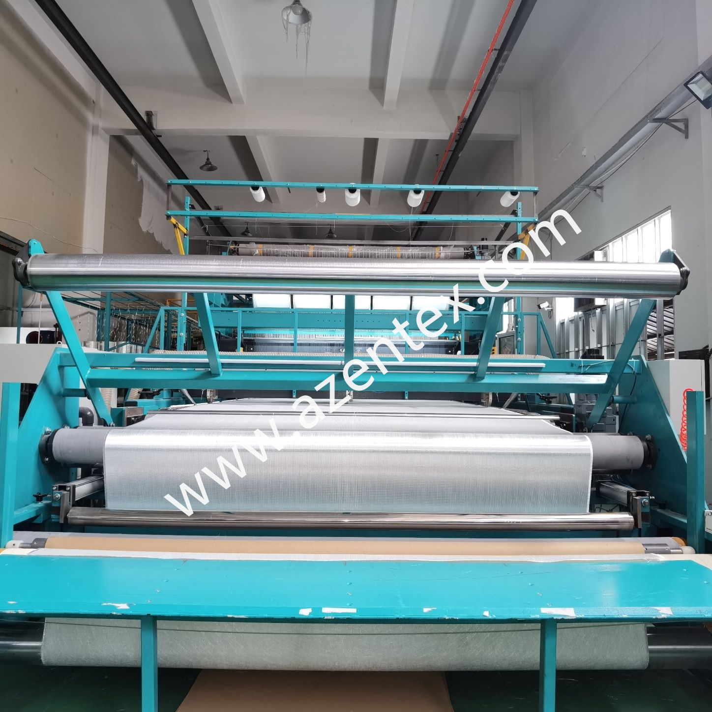 M&aacute;quina de tric&ocirc; de urdidura com inser&ccedil;&atilde;o de trama biaxial Fiberclass