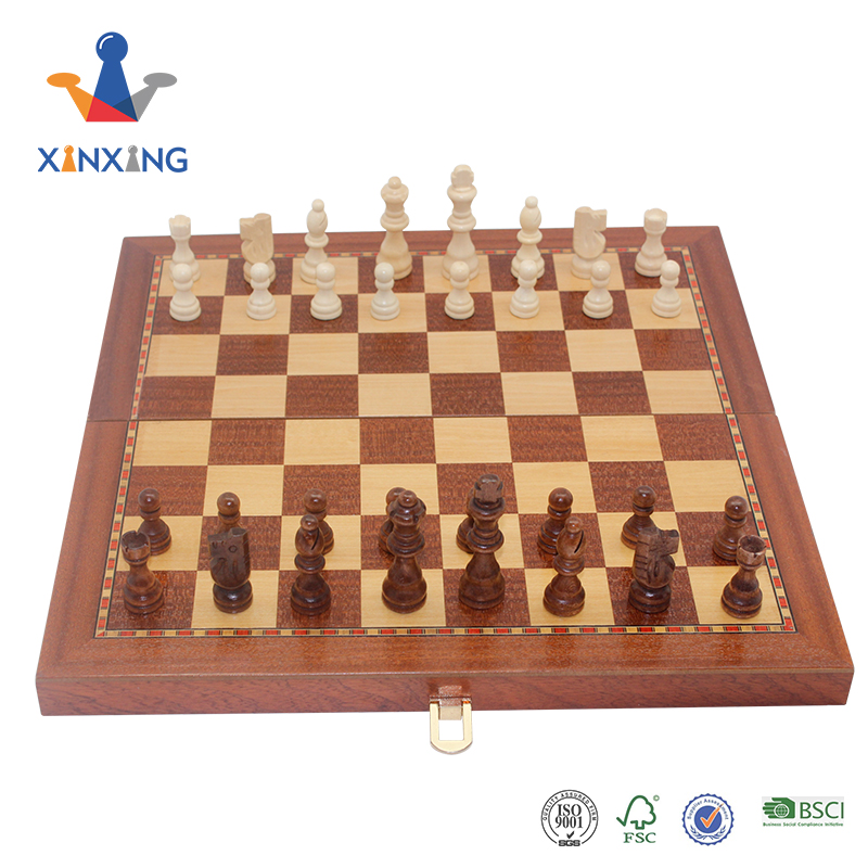 A Foldable Chess Board Which Has Pieces Built into The Chess Box Convenient And Portable