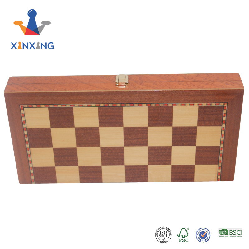 A Foldable Chess Board Which Has Pieces Built into The Chess Box Convenient And Portable