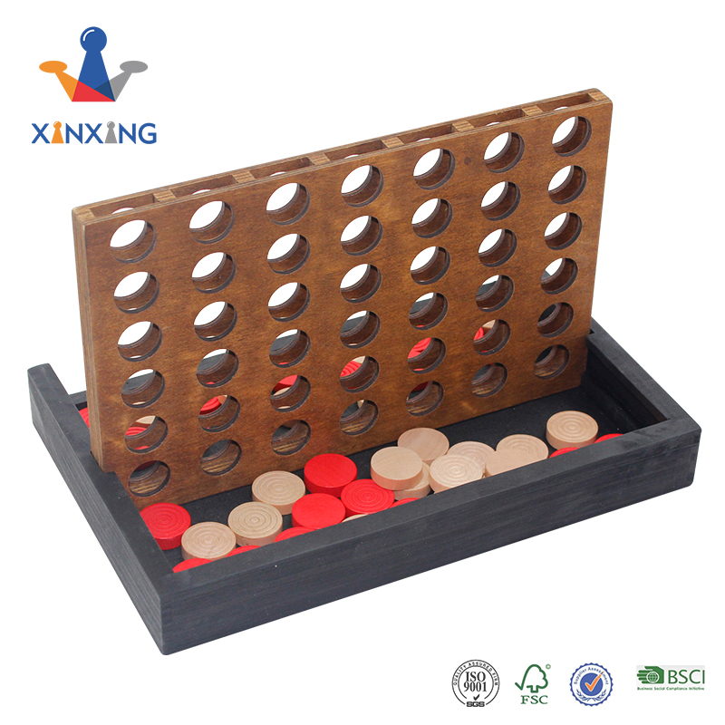 Wood four in a row board game on table for kids
