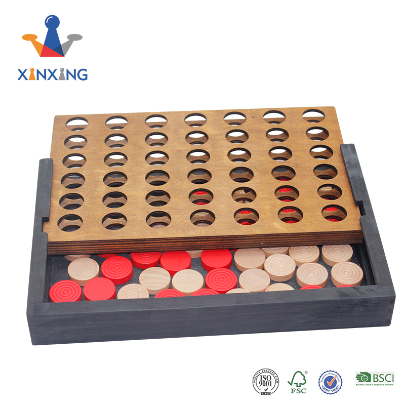 Wood four in a row board game on table for kids