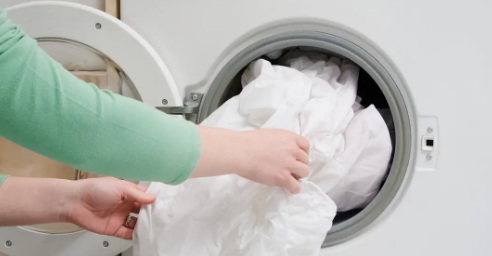 Quel réglage pour laver les draps de lit dans la machine à laver