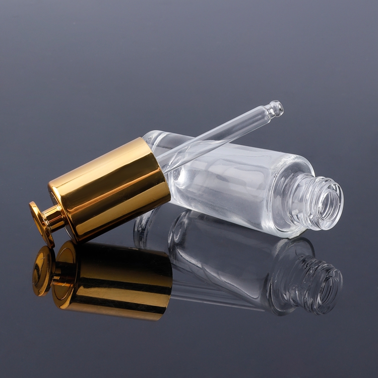 Fabricación de envases Oro 15 ml Botella de suero de vidrio reutilizable Aceite esencial Frasco cuentagotas cosmético