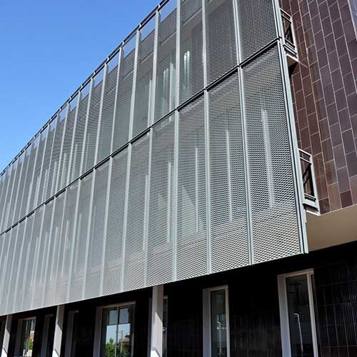 Clinica-Universitaria-Manresa-Imar-Expanded-&-perforated--Galvanised-Facade-Architect-041