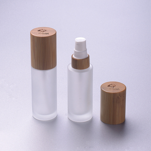 30ml body lotion frosted glass pump bottle with bamboo cap