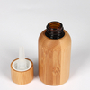 Eco Friendly Mini Packaging 10ml Cosmetics Bamboo Essential Oil Glass Bottle Supplier
