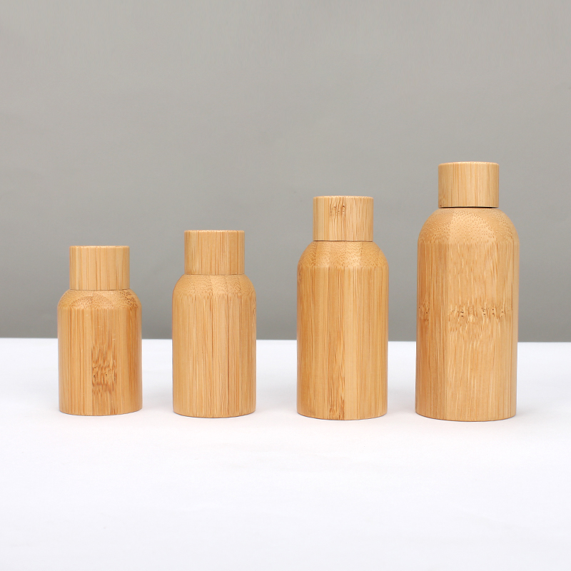 Eco Friendly Mini Packaging 10ml Cosmetics Bamboo Essential Oil Glass Bottle Supplier