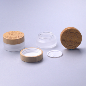 High quality 15g 30g 50g cream glass jar with bamboo child resistant screw cap with engraving logo